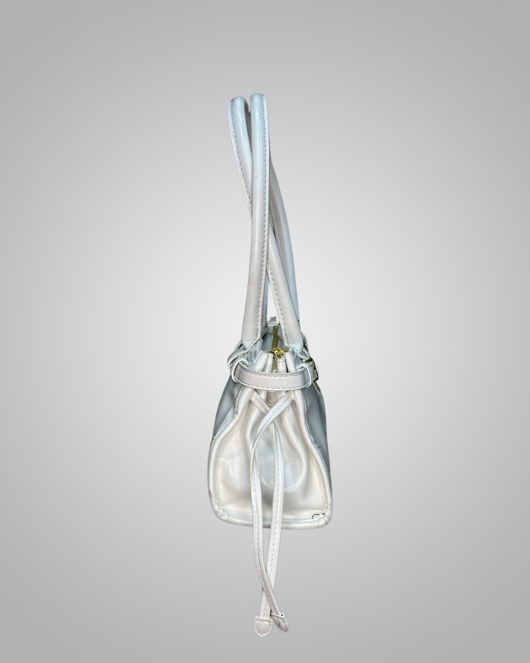 Clear handbag with drawstring on a gray background