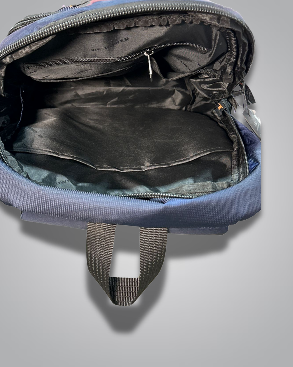 Open blue backpack showing interior with camouflage pattern on a light gray background- Valentino Impex