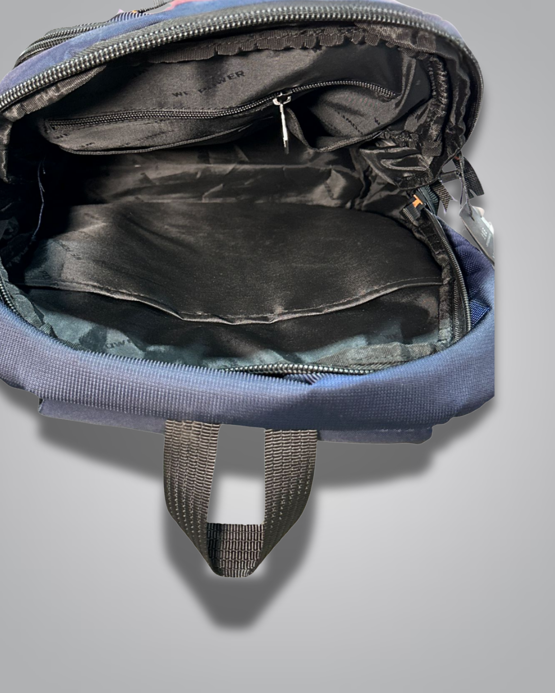 Open blue backpack showing interior with camouflage pattern on a light gray background- Valentino Impex