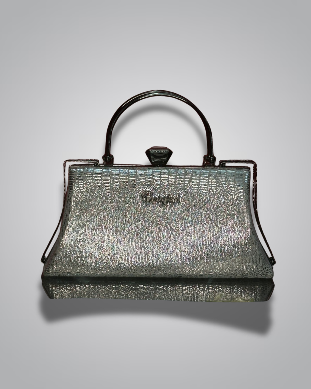 Vintage handbag with metallic sheen on a gray background- Valentino Impex