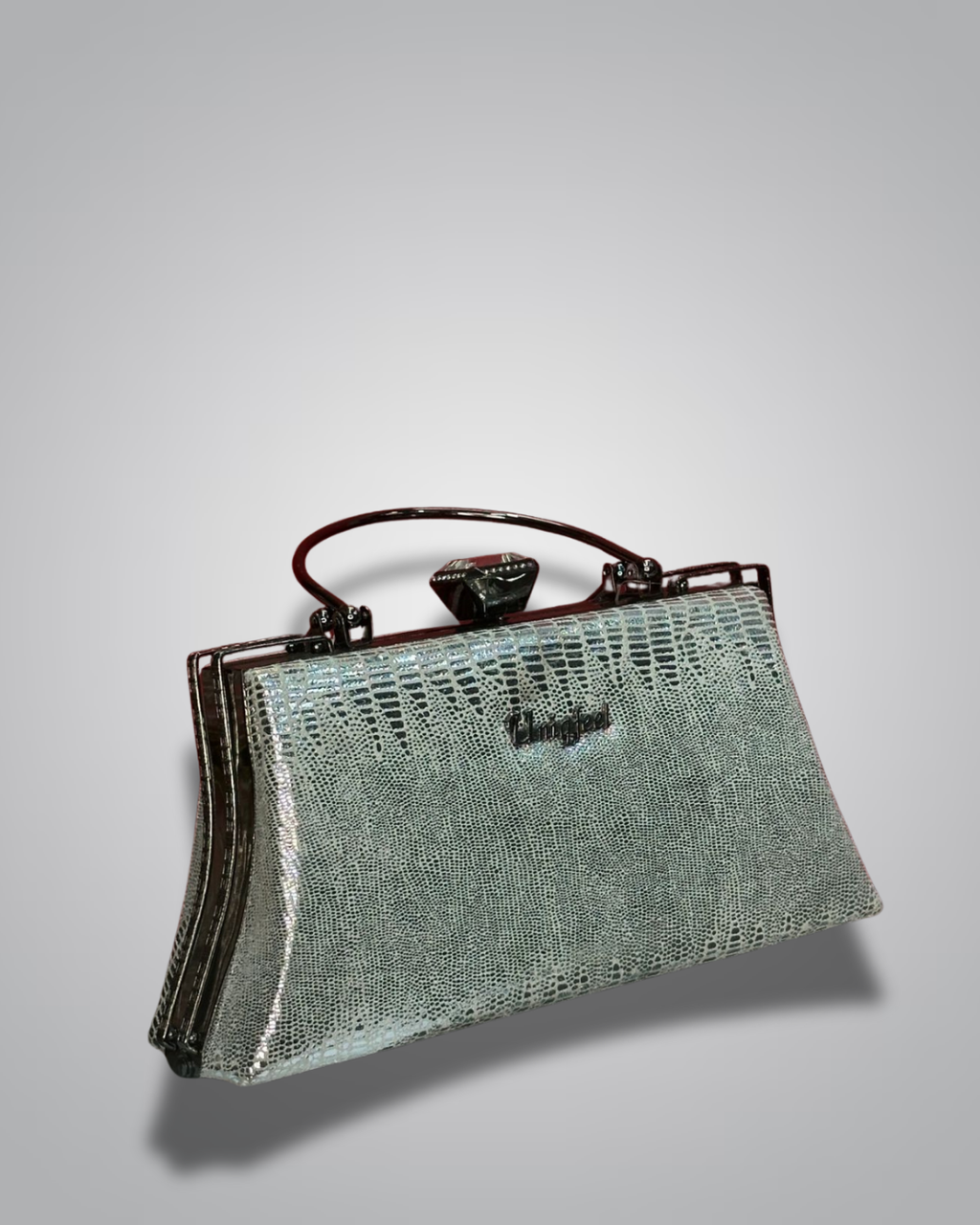Vintage handbag with metallic sheen on a gray background- Valentino Impex
