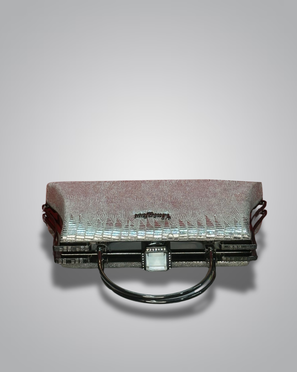 Vintage handbag with metallic sheen on a gray background- Valentino Impex