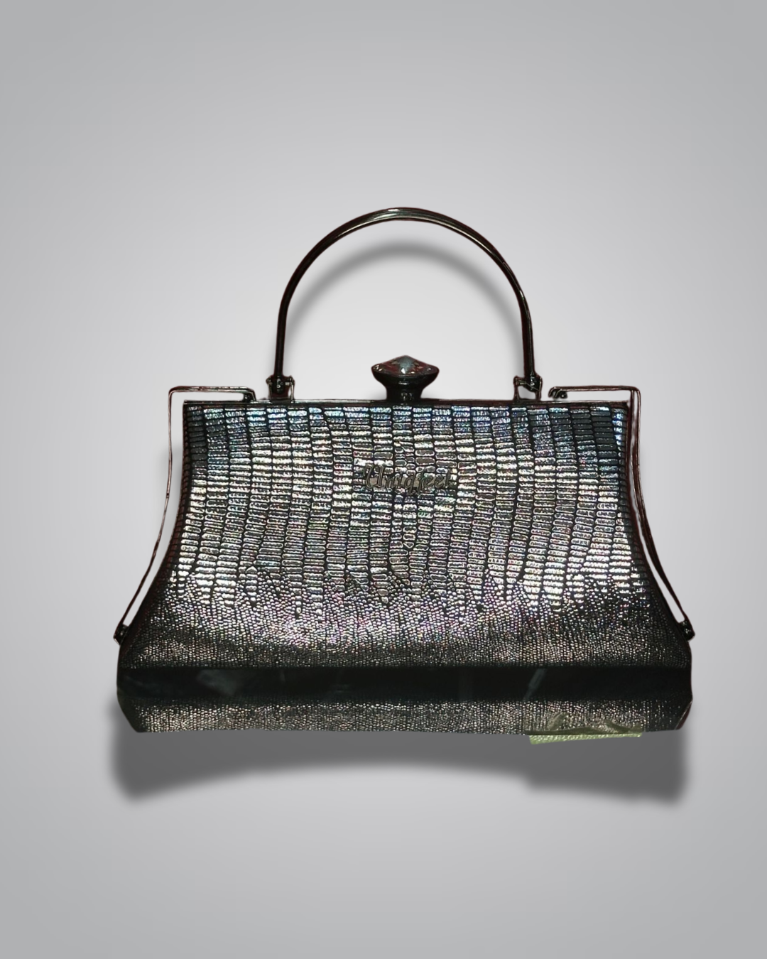 Vintage handbag with metallic sheen on a gray background- Valentino Impex