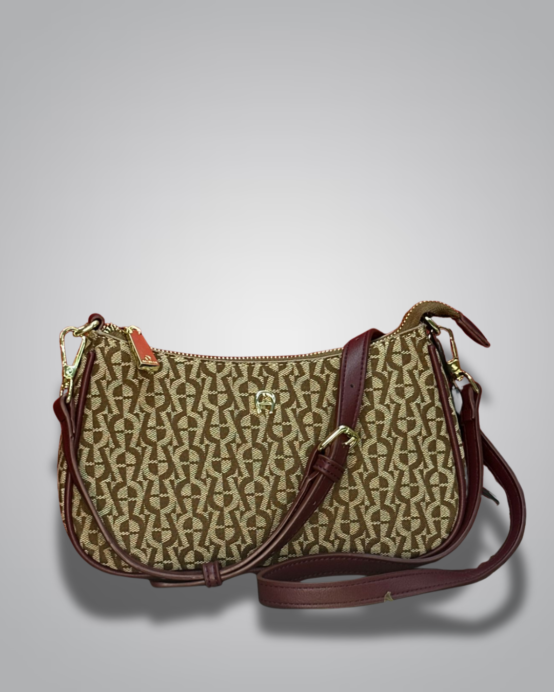 Handbag with monogram pattern on a gray background- Valentino Impex