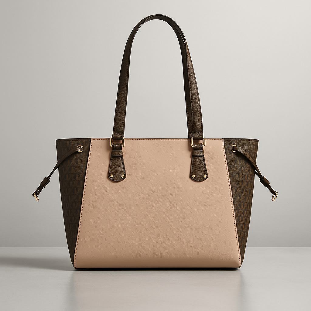 Two-tone handbag with brown and beige sections on a gray background