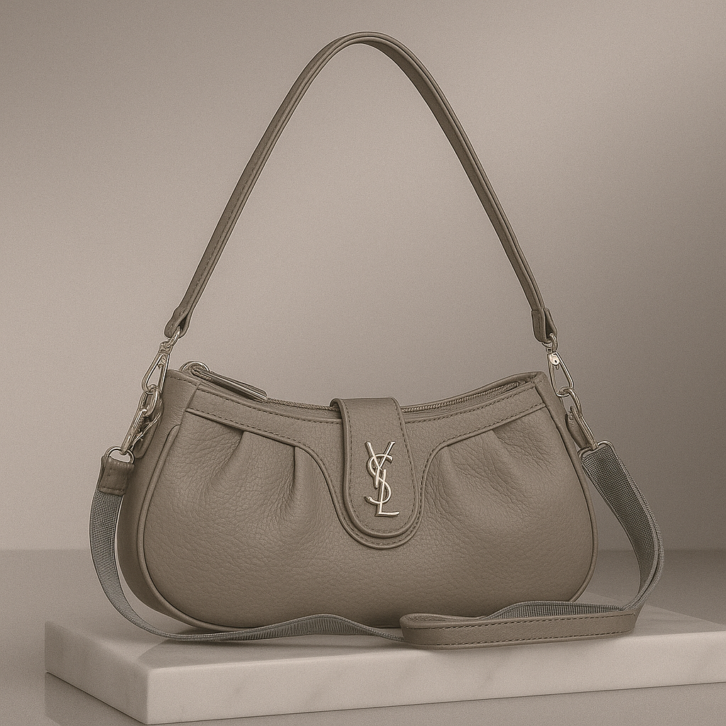 Gray handbag with a brand logo on a neutral background