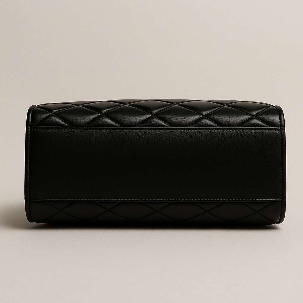 Bottom view of the YSL tote showing structured leather base