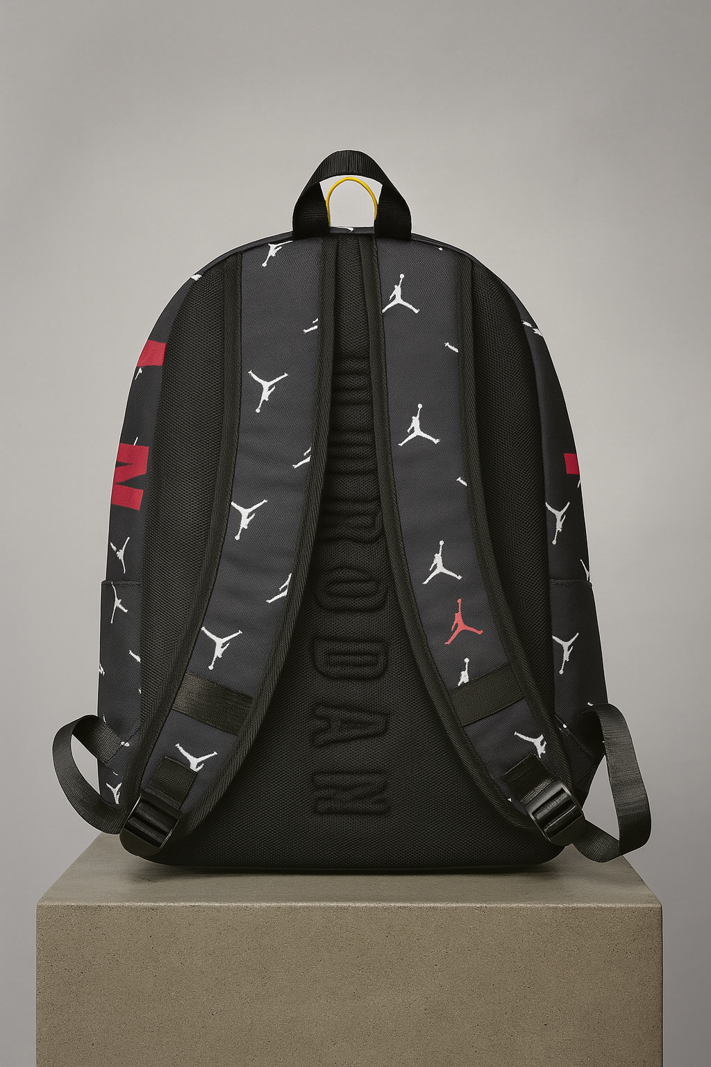 Black backpack with Jordan logo and branding on a gray background