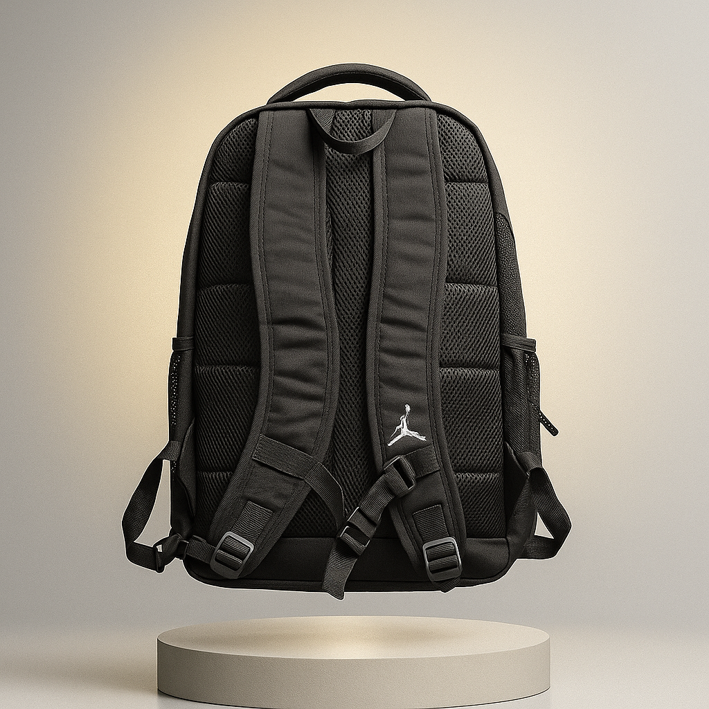 Black backpack with a brand logo on a neutral background- valentino impex